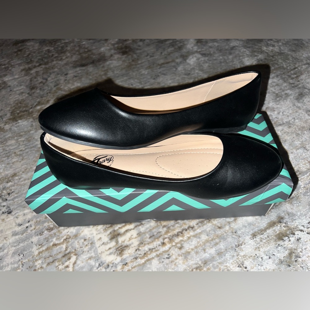 Black ballet flats